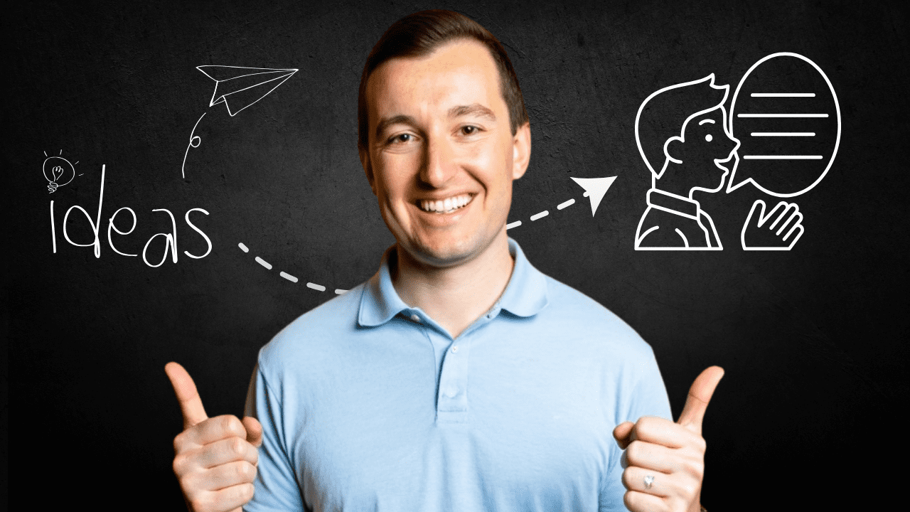 Smiling man giving thumbs up in front of blackboard with doodles of ideas and communication